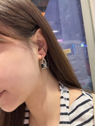 CHANEL Marcelline Lock Charm Stud Earrings