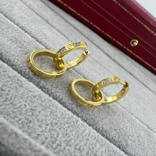 Cartier LOVE collection double-hoop earrings with screw motifs and half-set diamonds
