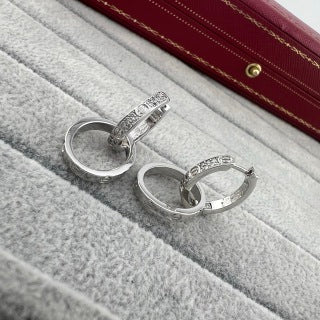 Cartier LOVE collection double-hoop earrings with screw motifs and half-set diamonds