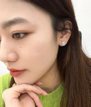 Cartier Solitaire Earrings