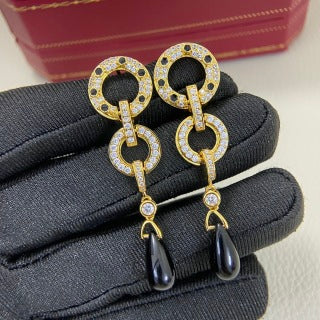 Cartier diamond-set leopard-motif tassel earrings