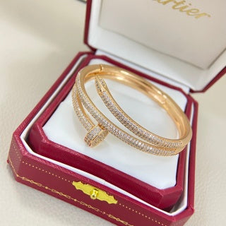 Cartier Juste un Clou bracelet, three-row, fully diamond-set, with spring-loaded clasp