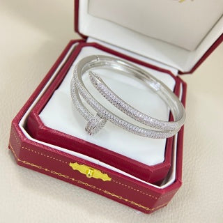Cartier Juste un Clou bracelet, three-row, fully diamond-set, with spring-loaded clasp