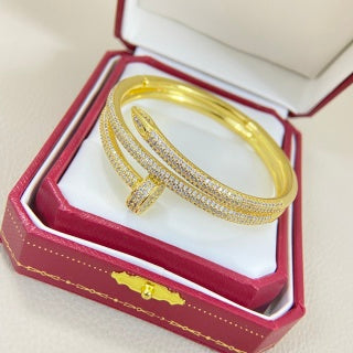 Cartier Juste un Clou bracelet, three-row, fully diamond-set, with spring-loaded clasp