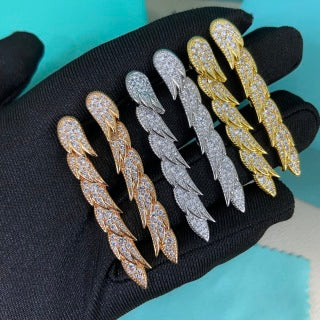 Tiffany long feather stud earrings with full pavé diamonds