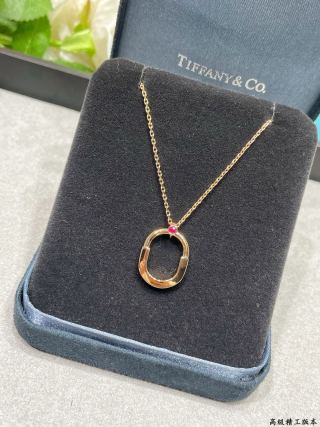 Tiffany Small Lock Necklace with a Single Pink Diamond