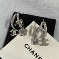 CHANEL Eveloria Silver Charm Cascade Drop Earrings