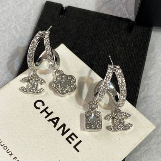 CHANEL Eveloria Silver Charm Cascade Drop Earrings