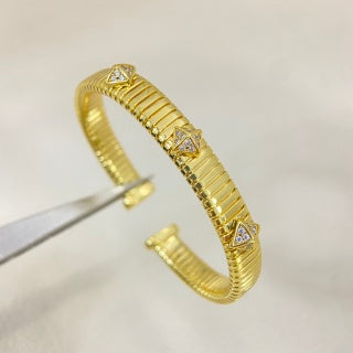 Bvlgari Tri-Color Gold Geometric Cuff Bracelet – Elegant Luxury Jewelry