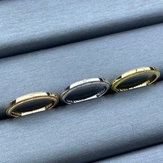 Tiffany narrow ring with a single diamond and square bead-edge detailing