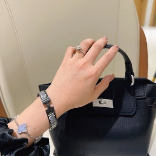 Hermès Clic H Noir Zebra Enamel Bracelet