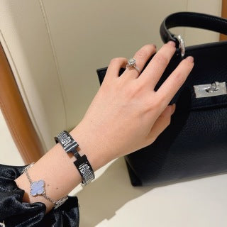 Hermès Clic H Noir Zebra Enamel Bracelet