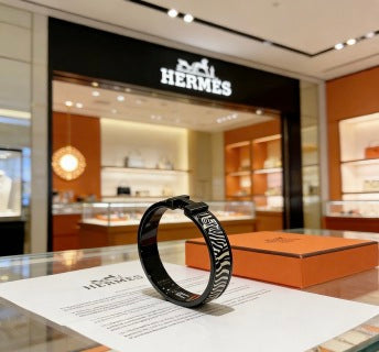 Hermès Clic H Noir Zebra Enamel Bracelet