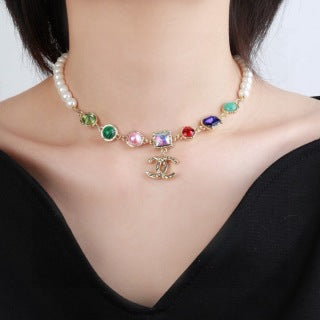 CHANEL Coraline Pearl Rainbow Charm Necklace