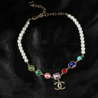 CHANEL Coraline Pearl Rainbow Charm Necklace