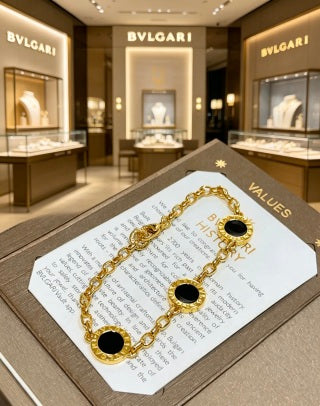 Bvlgari Gold Black Onyx Accent Link Bracelet – Elegant Luxury Jewelry